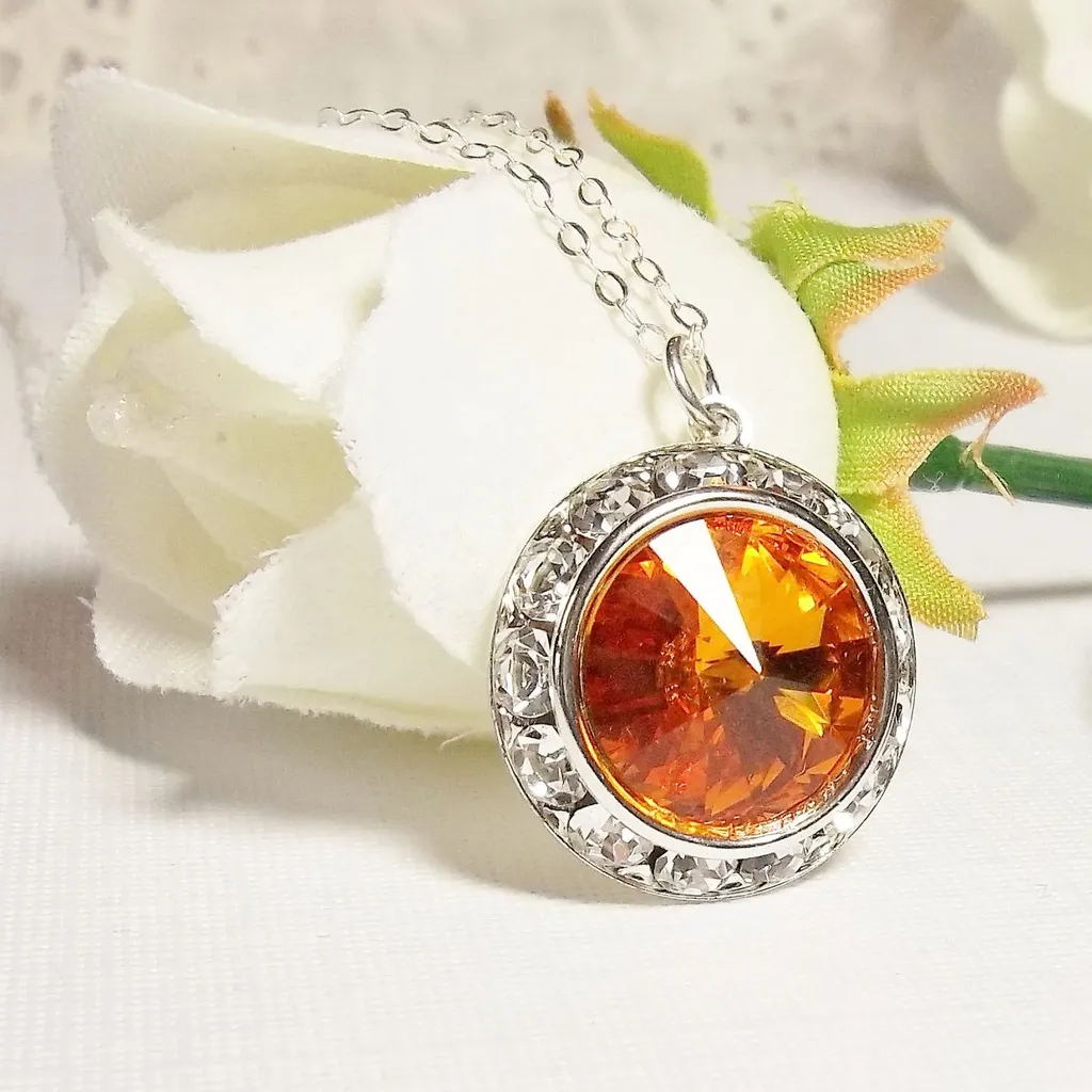Украшение с оранжевым топазом