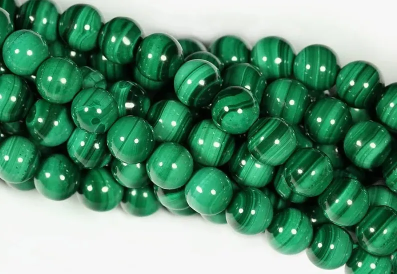 Бусины из малахита