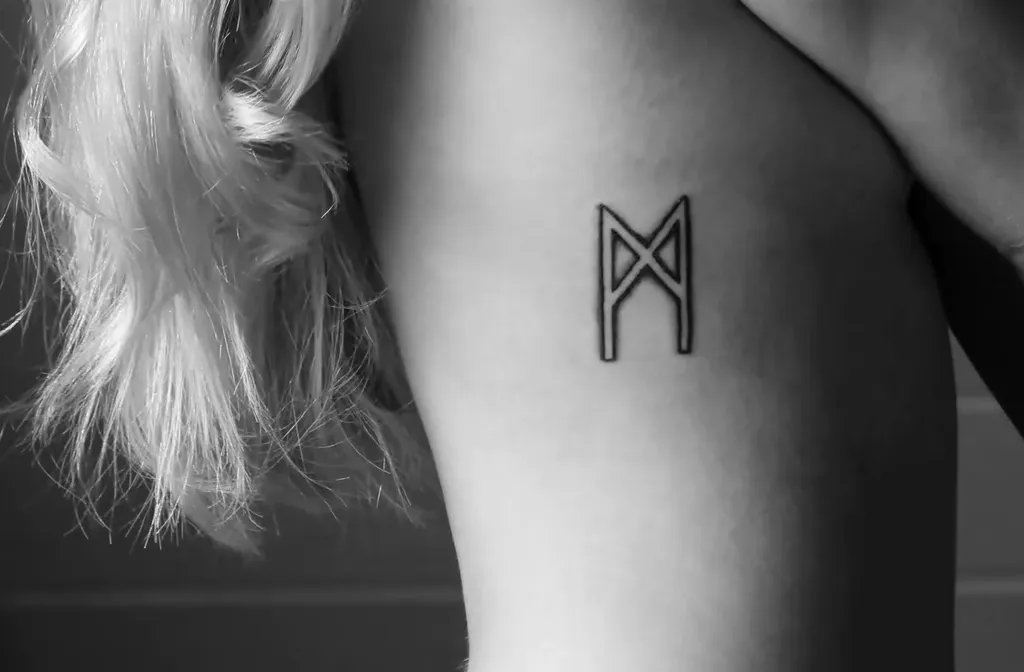 Тату Манназ