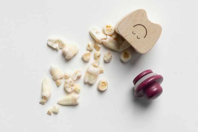 Снится много разных зубов