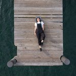 Девушка спит на причале