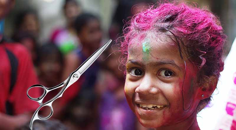 стригут на фестивале красок