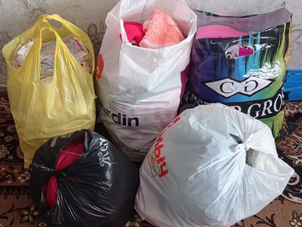 вещи в пакетах