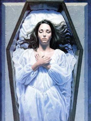 Лежит в гробу